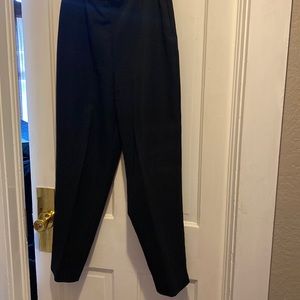 Black slacks with slits at ankle -side zipper